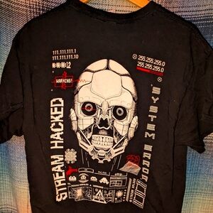 Zeke beats black tee